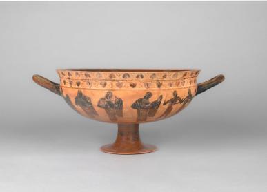 Cup with two warriors fighting